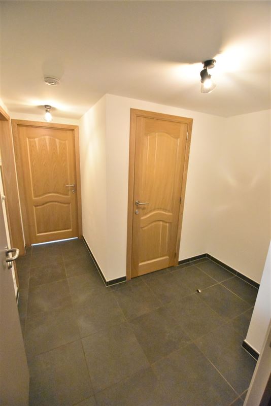 Appartement 2ch. + 2 parkings en plein centre !