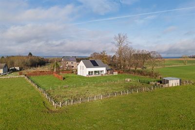 Villa met 4 slaapkamers gelegen aan het einde van de bouwzone op een oppervlakte van 11a 30ca met de mogelijkheid om het aangrenzende perceel van 11a 61ca te verwerven.