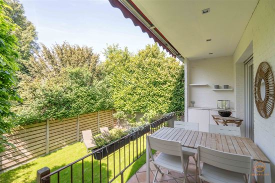 Ruim glvl appt met 3 slpk, terras, tuin en 2 garages